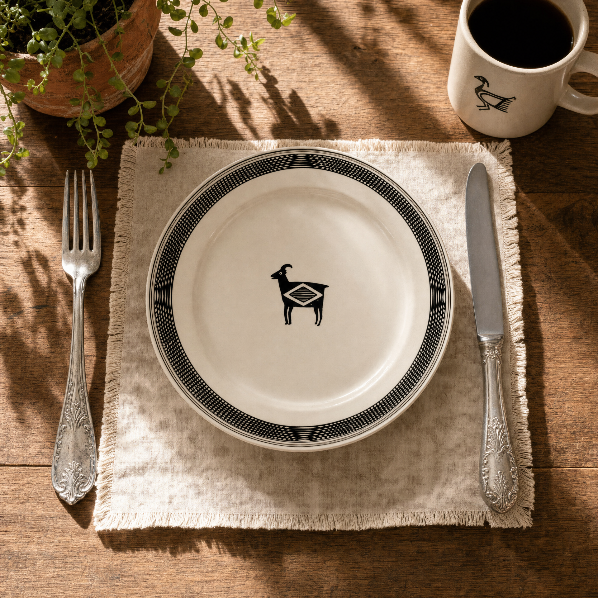 HF Coors Mimbreno Heritage Collection - Black and white Mimbres pattern plate on rustic wood table