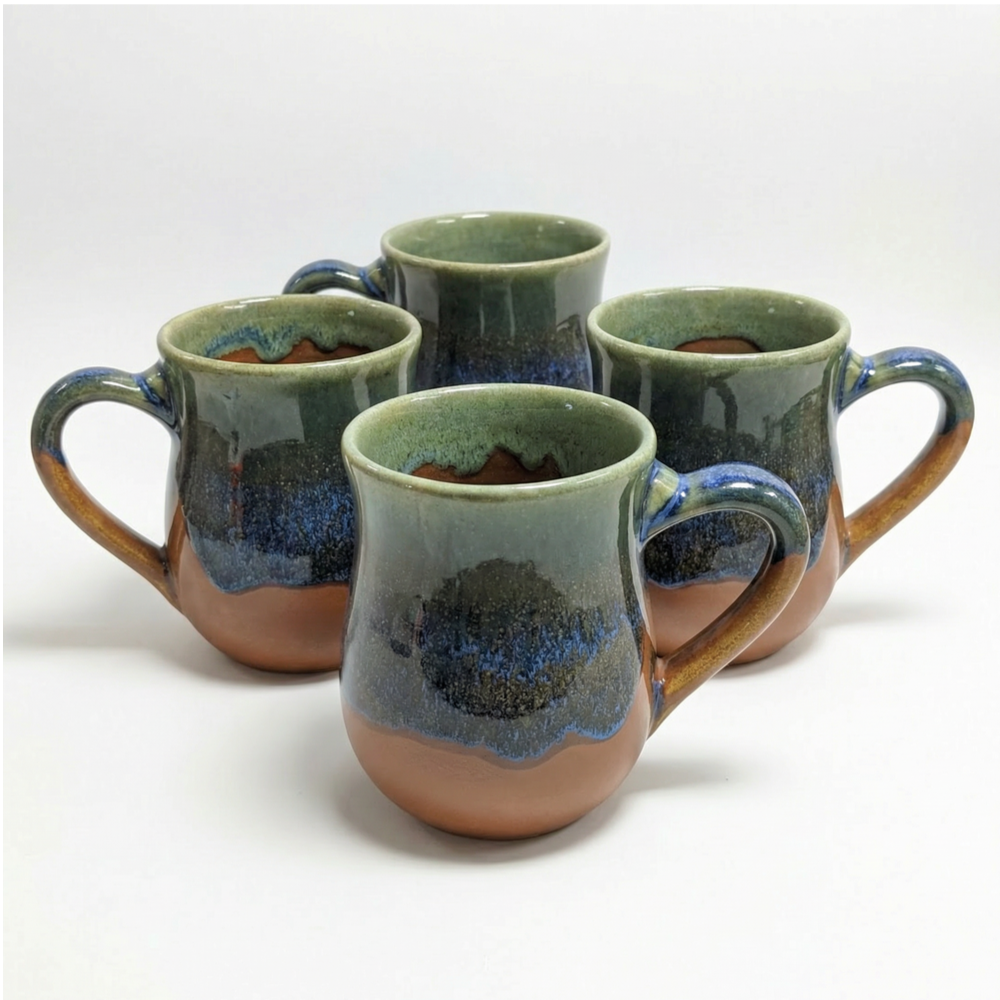 Set of four HF Coors Blue Bayou reactive glaze 15oz ceramic mugs showing unique glaze variation in sage green navy blue and terracotta handcrafted in Tucson Arizona